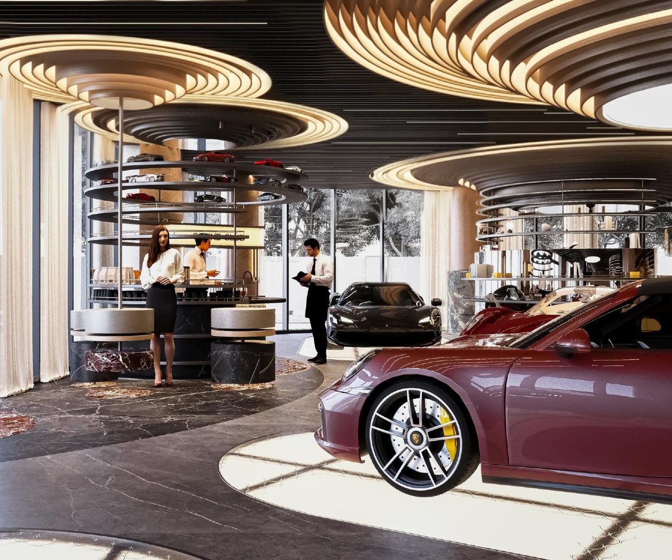 A red car on a lit plinth on the marble floor