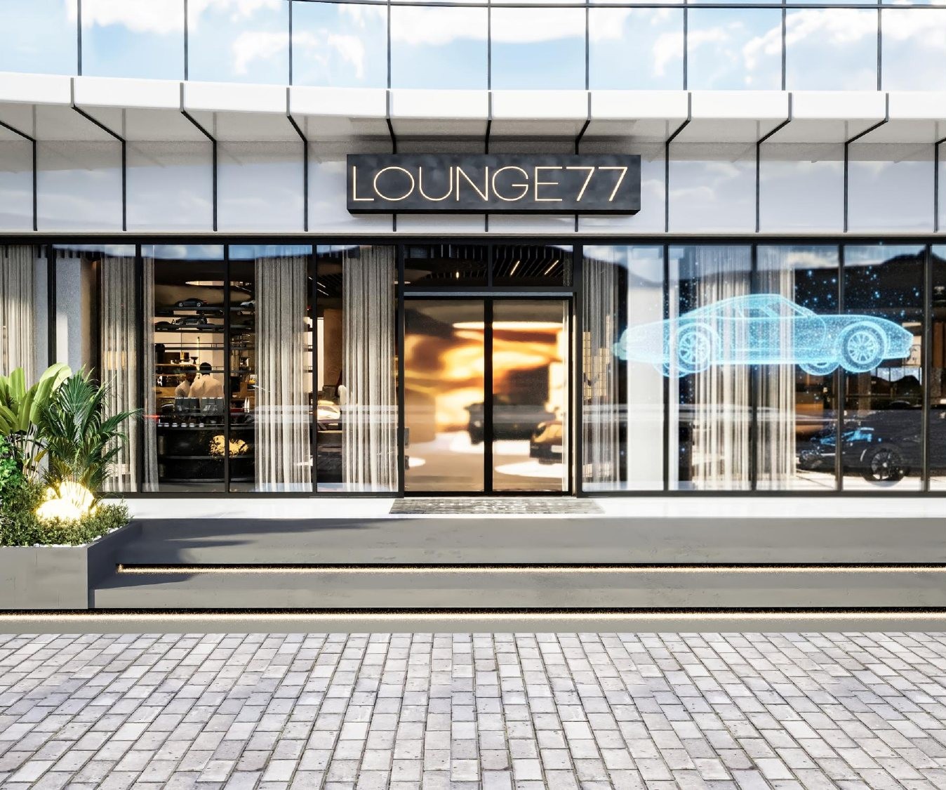 The glass façade of LOUNGE77 with signage at night